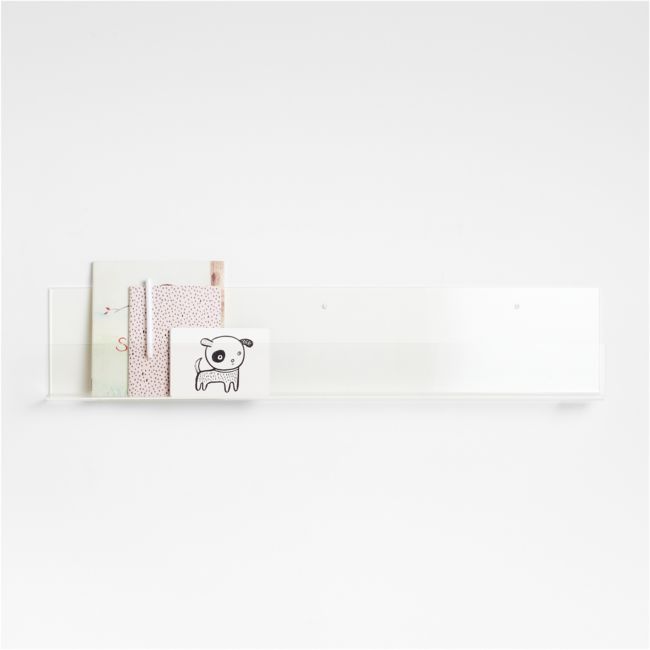 a white shelf with a sticker on it that has an animal drawn on it