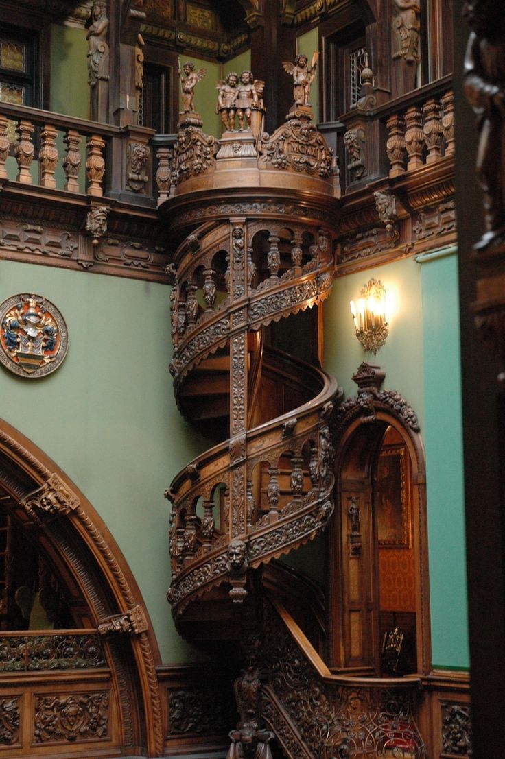 an ornate spiral staircase in a building