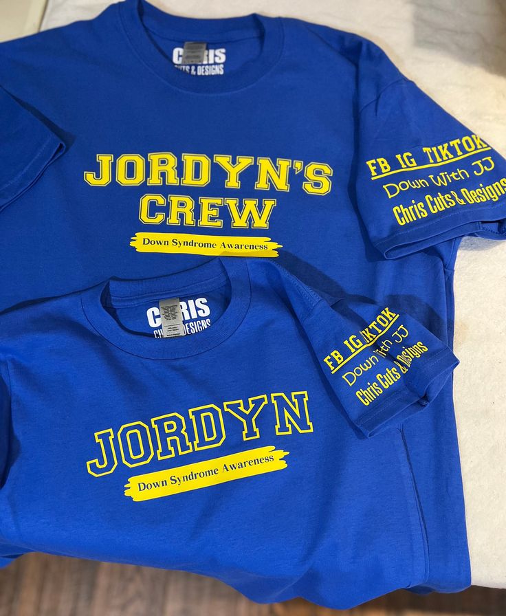 "This Shirt is Personalized with your child's name on the front of the shirt ( Jordyn is my daughter's name and just an example). The back print ( THREE 21 ) will be the same as pictured. If you want your Social media info also on the sleeves, please write all the info in the \" personalization section\" before ordering. Personalized Down Syndrome Awareness Varsity Shirt , Buddy Walk Family Group Shirts, Down Syndrome Gift, Unisex Adult Kids Youth Shirts Wear this One Of A Kind and special Down Blue Customizable Tops For Team Spirit, Family Matching Blue Pre-shrunk Shirt, Blue School Tops With Team Name, Blue College T-shirt With Name Print, Customizable Blue T-shirt For School Spirit, Blue T-shirt With Name Print For School, Blue T-shirt With Name Print For Fan Merchandise, Father's Day School Spirit Cotton T-shirt, Blue Tops With Name Print For College