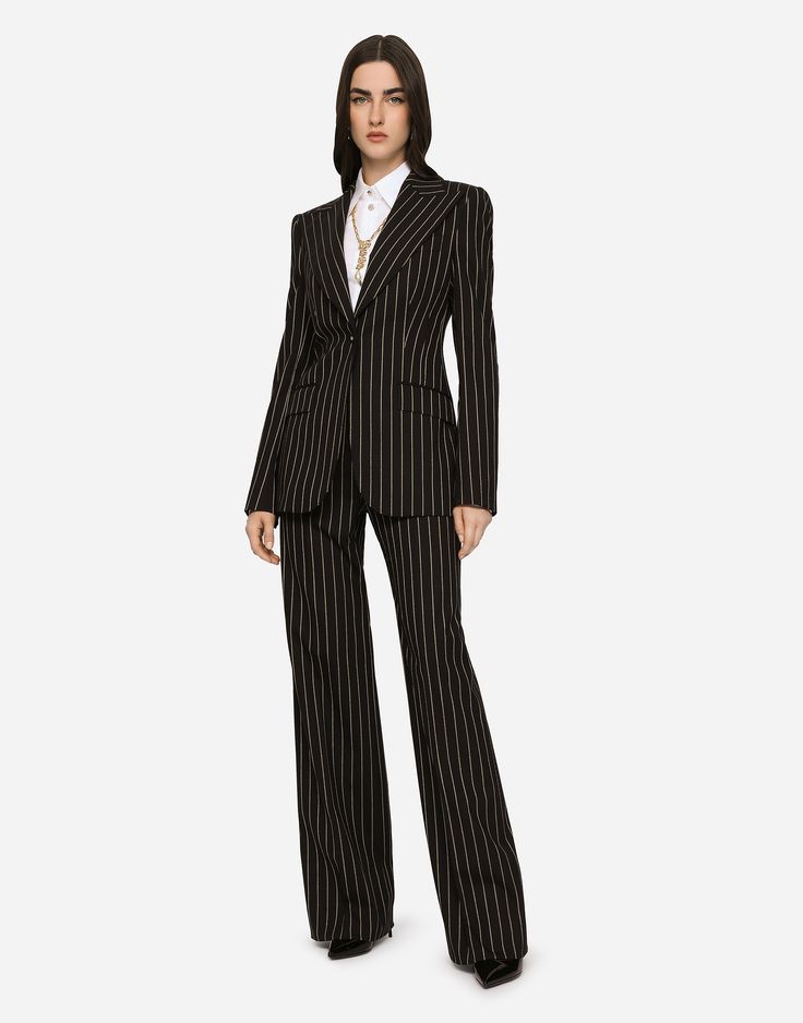 Find DOLCE & GABBANA Pinstripe Wool Palazzo Pants on Editorialist. Pinstripe wool palazzo pants: Dolce high waist Front slant pockets Welt back pockets with canneté-covered button with the DG logo Belt loops Inner leg: 87 cm Hem: 28 cm Zipper and canneté-covered button with DG logo The model is 175 cm tall and wears a size IT 40 Made in Italy Pinstripe Suit Women, Form Outfits, Gentleman Outfit, Sixth Form, Prom 2024, Dg Logo, Blazer Outfit, Pinstripe Suit, Breasted Blazer