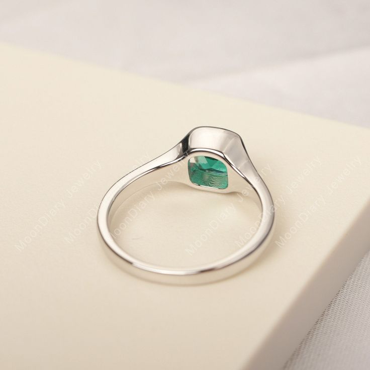 All HANDMADE ITEMS SHIP IN APPROX 8 DAYS Main Stone: Lab created emerald Main Stone Size: cushion cut 6 mm x 6 mm Main Stone Weight: 0.98 carat Side Stone: None Height From The Ring Setting Bottom(to gemstone top): about 4.43 mm Width of Ring band Measure: gradually varied,about 2.28 to 2.3 mm Material: 925 Sterling Silver/14K White Gold/14K Yellow Gold/14k Rose Gold Engraved: Available For FreeNo more than 13 letters) Customized:Of course! Tell me what you want Includes With Order: All of my st Silver Princess Cut Emerald Ring For May Birthstone, Princess Cut Silver Emerald Ring For May Birthstone, Minimalist Emerald Cut Birthstone Ring With Bezel Setting, White Gold Emerald Ring With Bezel Setting As Gift, Modern Emerald Birthstone Ring For Anniversary, Silver Cushion Cut Ring With May Birthstone, Silver Emerald Ring With Cushion Cut, Silver Cushion Cut Ring For May Birthstone, Silver Cushion Cut Emerald Ring In Fine Jewelry Style