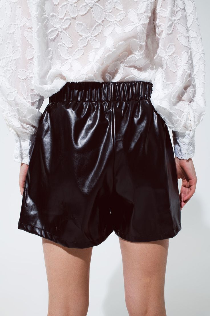 Add a touch of edgy sophistication to your wardrobe with our Black Faux Leather Shorts. These shorts are the perfect choice for a variety of occasions, combining style and comfort effortlessly.    With a short length and a standard fit, these shorts offer a classic and versatile look. The straight cut and faux leather material give them a sleek and stylish appearance, perfect for parties and more. Plus, they come with the convenience of pockets and a comfortable elastic waistband.    Crafted fr Black Faux Leather Shorts, Mens Lightweight Jacket, Black Leather Shorts, Faux Leather Shorts, Dressy Sandals, Mens Slides, Pants Fit, Style Party, Denim Jacket Men