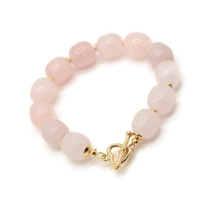 "For everyone who is looking for something special and unique in the field of jewelry, this bracelet made of high-quality natural stones is just the thing! Rose Quartz: self love, love, unconditional love, joy, inner peace, connection, matters of the heart Every stone is natural, so they may vary oh-so-slightly from one another. This bracelet makes a wonderful gift for any Rose Quartz lover in your family or friend circle. Anti Tarnish⭐️ Hypoallergenic MEASUREMENTS *Size of the beads - 12:13mm * Adjustable Gemstone Beads Jewelry For Valentine's Day, Adjustable Natural Stone Bracelets For Valentine's Day, Valentine's Day Adjustable Bracelets With Natural Stones, Heart-shaped Adjustable Gemstone Beads Bracelet, Rose Quartz Beaded Bracelets As Gift, Pink Natural Stones Bracelet For Everyday, Everyday Pink Bracelets With Natural Stones, Everyday Pink Natural Stone Bracelets, Everyday Jewelry With Natural Stones And Rose Quartz