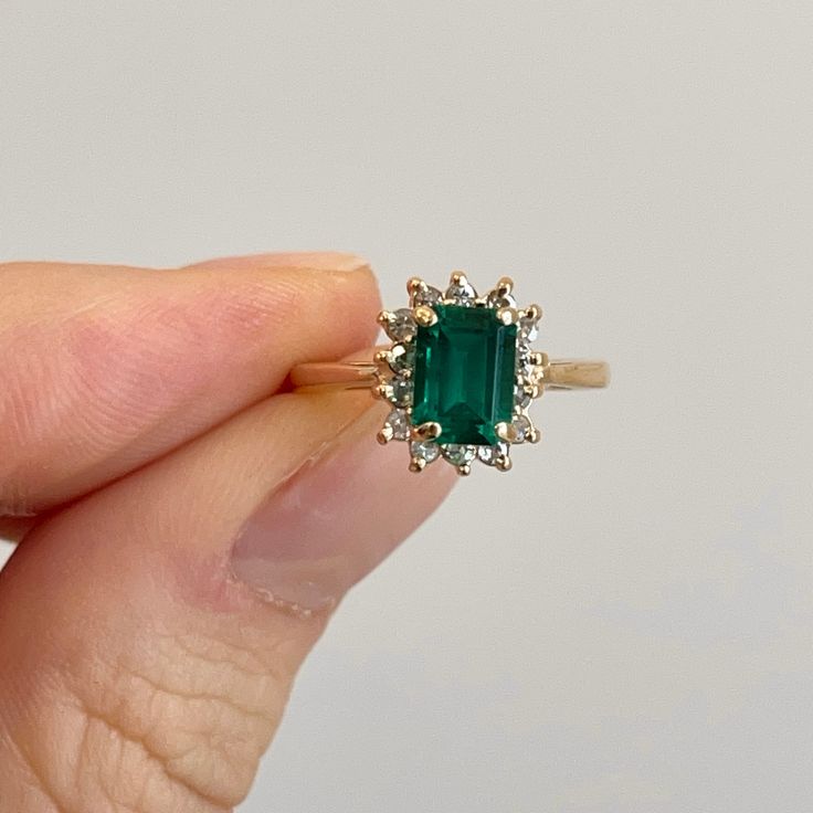 Vintage Emerald Ring Antique Jewelry, Vintage Gold Emerald Ring, Vintage Green Wedding Ring, Emerald Engagement Ring Art Deco, Dark Green Rings, Heirloom Style Emerald Ring With Halo, Heirloom Emerald Ring With Halo, 14k Gold Emerald-cut Halo Cluster Ring, 14k Gold Emerald-cut Cluster Ring With Halo Design