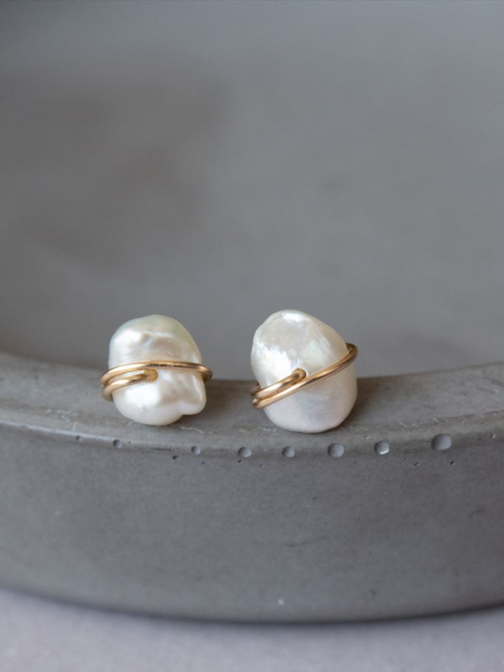 Freeform super cute and dainty stud earrings, featuring genuine little pearls, wire wrapped in gold filled or sterling silver wire. $25. Perfect everyday stud earrings for your cartilage and earlobe piercing. #studearrings #pearlearrings #studs #pearlstuds #bridalstudearrings @wirewrappedearrings #pearljewelry Minimalist 14k Gold Filled Wrap Earrings As Gift, Dainty Yellow Gold Wrap Earrings Gift, Gold Minimalist Pearl Earrings For Anniversary, Gold Pearl Earrings For Everyday Fine Jewelry, Minimalist Gold Pearl Earrings For Anniversary, Elegant Gold Plated Wrap Earrings For Everyday, White Gold Plated Minimalist Pearl Earrings, Minimalist White Gold Plated Pearl Earrings, Minimalist White Gold-plated Pearl Earrings