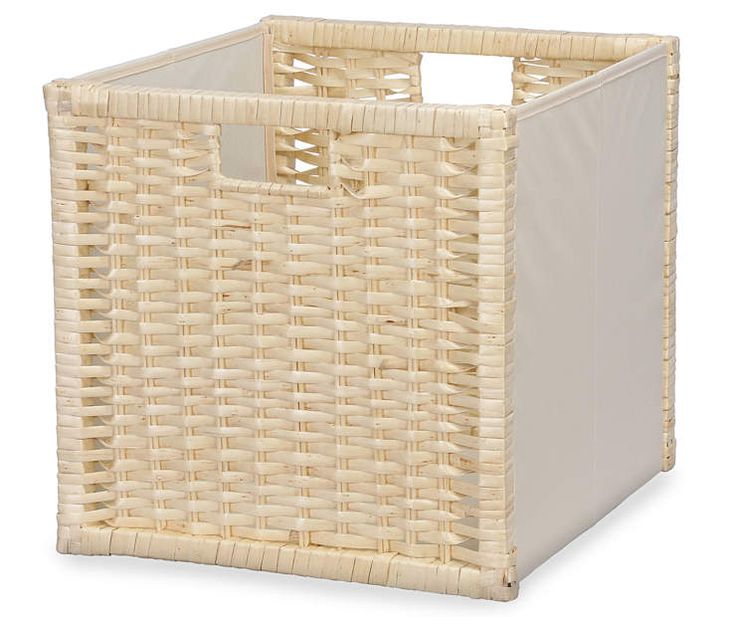 a large white basket with handles on the front and side sides, made out of wicker