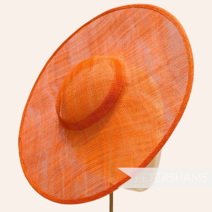 *This is not a fitted hat! You will need to sew in a headband or comb to attach it to your head* This burnt orange cartwheel hat base is a classic shape that has sprung into popularity in the past year. Made from 2 layers of stiffened sinamay, these cartwheels are ready to trim and are fitted with a petersham ribbon on the inside crown edge. Simply add a comb or headband to secure to the head. Hat base measures: Width: 35.5cm (14 inches) Crown Width: 13.5cm (5.3 inches) Crown Height: Approximately 3.5cm (1.7 inches) In this listing we give you the option of attaching an elastic, this is to help secure the fascinator base to your head as it is not a fitted/finished headpiece. If you would prefer to use a headband or a comb, these can be purchased separately in our shop for you to sew in. Fo Adjustable Orange Straw Hat With Curved Brim, Orange Sun Hat With Curved Brim, Orange Curved Brim Sun Hat, Orange Brimmed Straw Hat With Adjustable Fit, Adjustable Brimmed Orange Straw Hat, Orange Adjustable Hat With Curved Brim, Adjustable Brimmed Orange Hat, Adjustable Orange Hat With Curved Brim, Orange Adjustable Brimmed Straw Hat