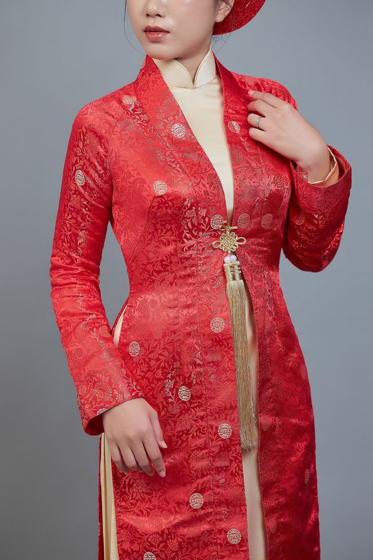 Wedding ao dai; Vietnamese traditional dress in red and champagne color. MEASUREMENTS, SHIPPING TIME ETC.: Free custom fit; we will send you a link to our simple online measurement form within 24 hours of receiving your order. Please allow 3-4 weeks (total) for custom tailoring and shipping, once measurements are received. Please note; we make every effort to ensure our photos accurately represent the true colors of each garment, but due to the nature of different devices, screen brightness, lighting conditions etc. small variations can sometimes occur. If you have any questions about colors or anything else, please don't hesitate to contact us. Elegant Cheongsam For Traditional Ceremonies, Formal Long Red Cheongsam, Elegant Long Ao Dai For Ceremonial, Red Long Cheongsam For Wedding, Elegant Long Ao Dai For Ceremonial Use, Elegant Long Ao Dai For Ceremonial Occasions, Long Red Cheongsam For Wedding, Elegant Long Red Gown, Festive Elegant Long Sleeve Cheongsam