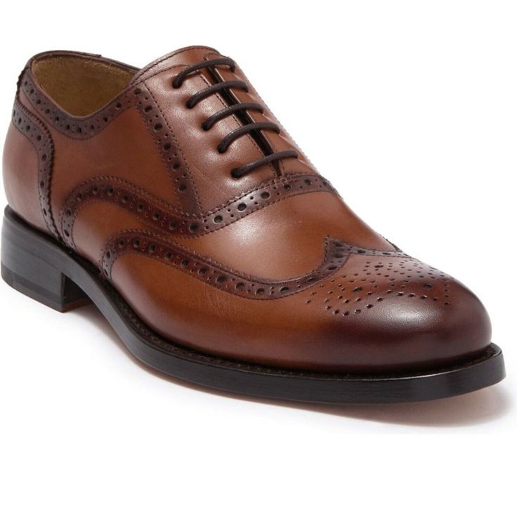 A Wingtip Leather Oxford That Will Stand The Test Of Time. Round Wingtip Toe Lace-Up Vamp Leather Construction Broguing And Topstitching Leather Upper And Sole Business Wingtip Oxford With Leather Sole, Classic Wingtip Oxford Shoes For Business, Classic Wingtip Oxford For Business, Semi-formal Cognac Oxfords With Brogue Detailing, Classic Brogue Oxford Shoes For Semi-formal Occasions, Classic Brogue-detailed Oxford Shoes For Semi-formal Occasions, Business Wingtip Oxford Shoes With Goodyear Welt, Classic Oxford Shoes With Brogue Detailing, Wingtip Oxford With Leather Sole For Formal Occasions