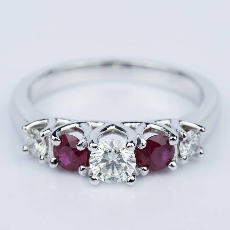 Trellis Ruby & Diamond Gemstone Engagement Ring in White Gold (0.33 ct.) Luxury Cluster Ruby Ring With Center Stone, Luxury Ruby Cluster Ring With Center Stone, Luxury Cluster Ruby Ring With Diamonds, Luxury Ruby Cluster Ring With Diamonds, Luxury Red Cluster Diamond Ring, Luxury Gia Certified White Gold Ruby Ring, Gia Certified Fine Jewelry Ruby Ring In Platinum, Gia Certified Platinum Ruby Ring In Fine Jewelry, Gia Certified Platinum Ruby Ring