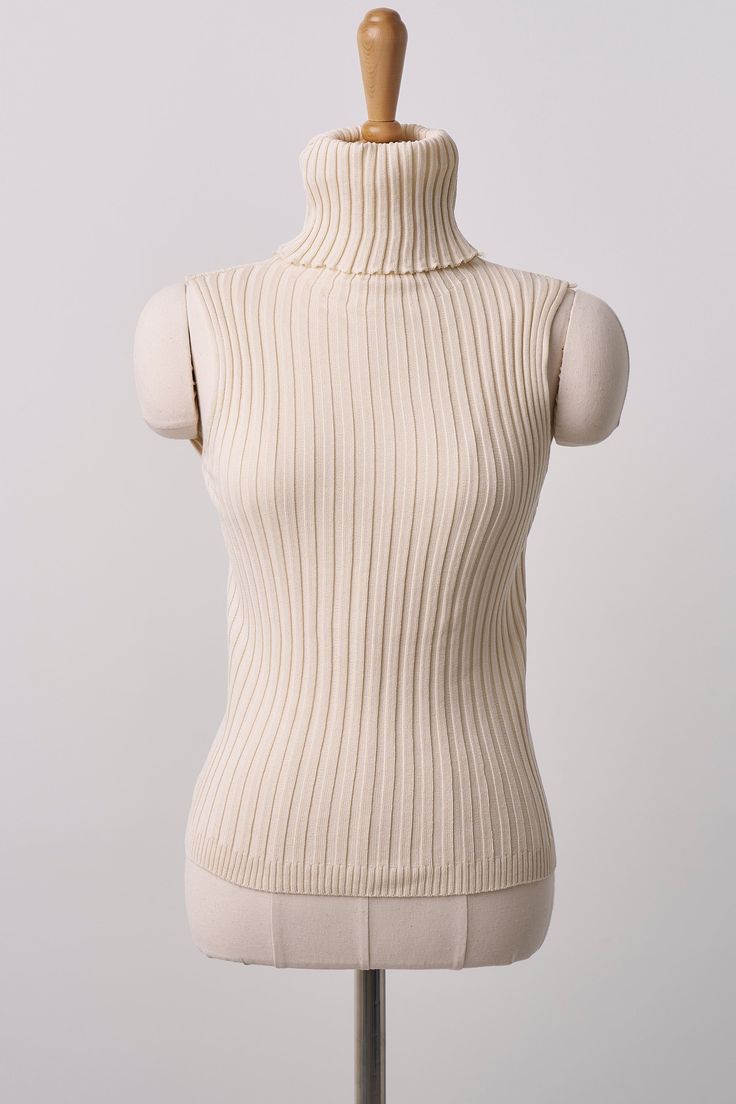 ESTIMATED RELEASE TIME : 10 BUSINESS DAYS Lucy Ribbed Sleeveless Top Ribbed knitted turtleneck top Slim fit, stretchy fabric Professional Clean Only / Do Not Tumble Dry Model's height is 5′ 7″ (175cm) Bust 32in Waist 23in Hip 35in and wearing S/M Flat measurement(S/M) shoulder 29cm, bust 27.5cm, armhole 15.5cm, length 57cm Knitted Turtleneck, Turtleneck Top, Turtle Neck Top, Ivory Color, Stretchy Fabric, Beige Color, Sleeveless Top, Cool Outfits, Turtle Neck