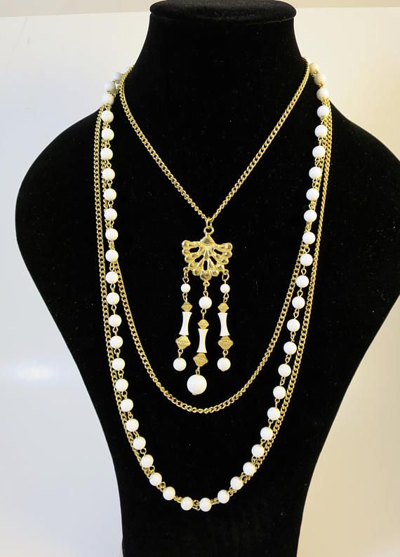 MOD Gold White Necklace Gold Fan Pendant White Gold Bead Vintage White Chain Necklace Gift, Vintage White Chain Necklace For Gift, White Long Necklace In Costume Jewelry Style, White Multi-strand Beaded Chain Necklace, White Beaded Long Chain Necklace, Bohemian White Pearl Chain Necklace, White Long Costume Jewelry Necklace, Vintage White Pearl Chain Jewelry, Vintage White Necklace With Beaded Chain