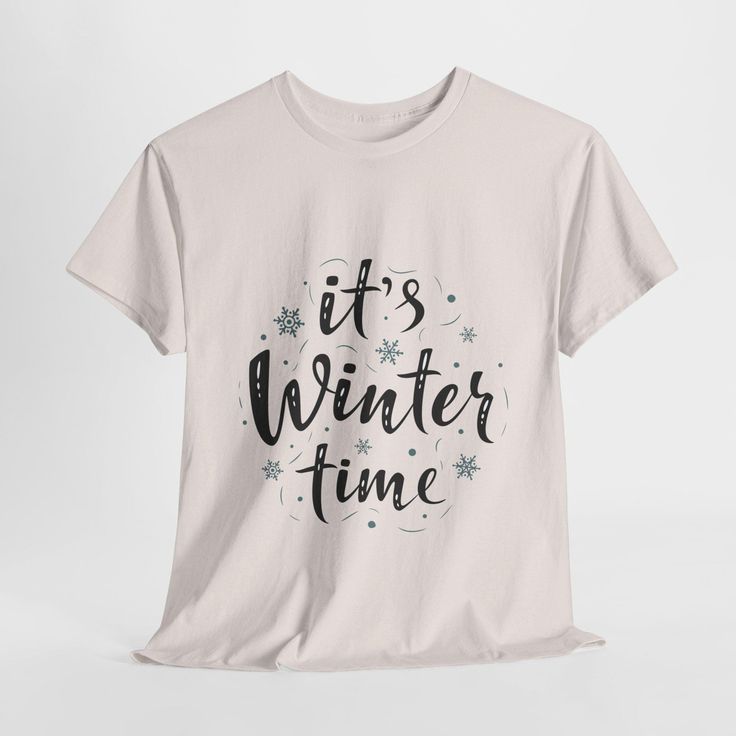 This Tee features the phrase "It's Winter Time" in an elegant script surrounded by snowflakes and dots, creating a festive and wintery design perfect for celebrating the season. The cool color palette and lively elements capture the magical feeling of snow falling during winter, making it ideal for holiday decor, winter-themed clothing, or festive greeting cards. It's a versatile piece that brings a touch of winter charm to any wardrobe or home decor. Product features - Twill tape shoulder tape for stabilization - Knitted in one piece without side seams for reduced fabric waste - Ribbed knit collar for elasticity and shape retention - Made from strong and smooth fabric perfect for printing - Medium fabric made from sustainable and durable 100% cotton Care instructions - Machine wash: warm Clothes Cold Weather, Tape Shoulder, Home Decor Product, Cool Color Palette, Snow Falling, Winter Themed, Winter Clothes, Winter Theme, Winter Time