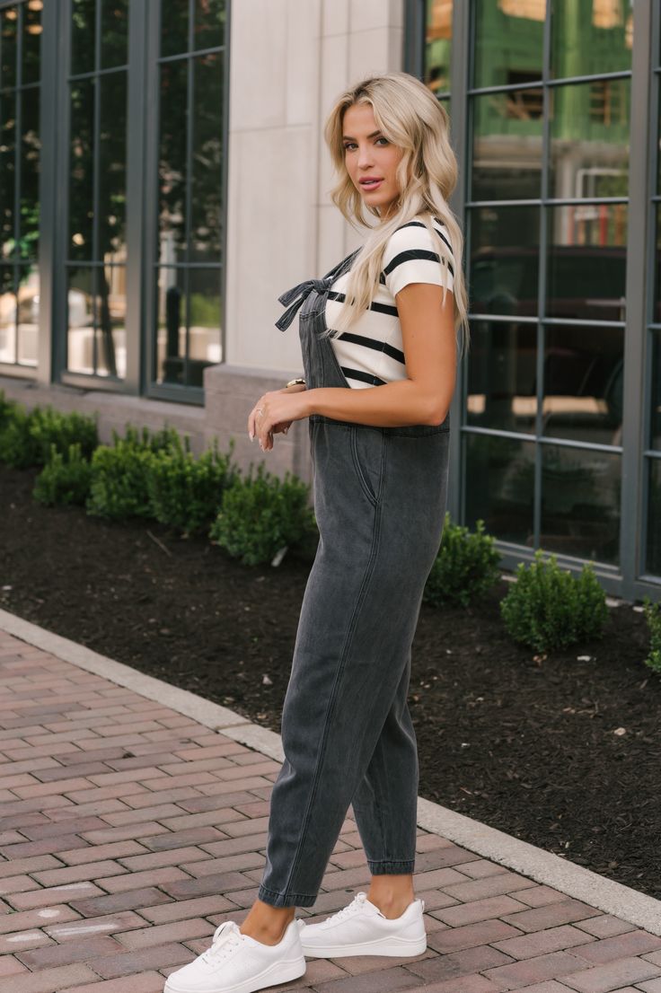 Details The perfect overalls for you have arrived! Our super stylish Washed Black Tencel Overalls would make the perfect fall outfit! Just throw on a basic white top and then pair it with sneakers and your favorite ball cap to complete the look. Adjustable straps Bust pocket & side pockets Shell: 80% Tencel, 20% Cotton Hand wash cold Hang to dry Color: Washed Black Colors may vary on different viewing devices Size and Fit Fits true to size S (2-4) M (6-8) L (10-12) Length measurements from shoul Casual Overalls With Pockets, Casual Cotton Overalls With Side Pockets, Casual Relaxed Fit Overalls For Fall, Casual Fall Overalls With Relaxed Fit, Casual Cotton Overalls For Workwear, Casual Relaxed Fit Overalls With Side Pockets, Casual Relaxed Fit Overalls For Day Out, Casual Overalls With Side Pockets For Workwear, Casual Cotton Overalls For Everyday