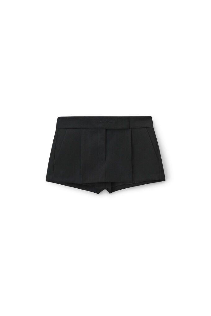 Mini skort with tailored waistband in black wool tailoring. Fitted low waist. Hem hits at high thigh. Hidden zip front fly closure. Back welt pockets. Composition: 100% wool. Lining: 100% polyester. Made in china. Model is 5' 11" and wears a size s. 1WC3235272001. Chic Short Skort With Belt Loops, Designer Skirts, Skirts For Women, Skirt Design, Skorts, Low Waist, Black Wool, Alexander Wang, Welt Pocket