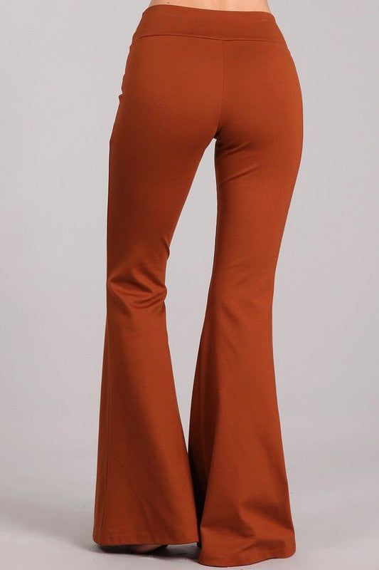 Discover the versatility of Chatoyant with these sleek Ponte Flare Bell Bottoms. Perfect for all occasions from casual to business attire, these pants feature a tummy control pull-on waistband and wrinkle-free, supportive Ponte fabric made of Viscose, Nylon, and Spandex. Inseam 32" inches Proudly made in the USA. Stay Sexy! Comfort Stretch Full Length Pants For Fall, Comfort Stretch Full-length Pants For Fall, Stretch Solid Color Bottoms For Fall, High Stretch Bottoms With Elastic Waistband For Fall, Stretch Full-length Dress Pants For Fall, Stretch Full Length Dress Pants For Fall, Solid Color Full-length Dress Pants For Fall, Fall Solid Color Full-length Dress Pants, Full Length Stretch Dress Pants For Fall