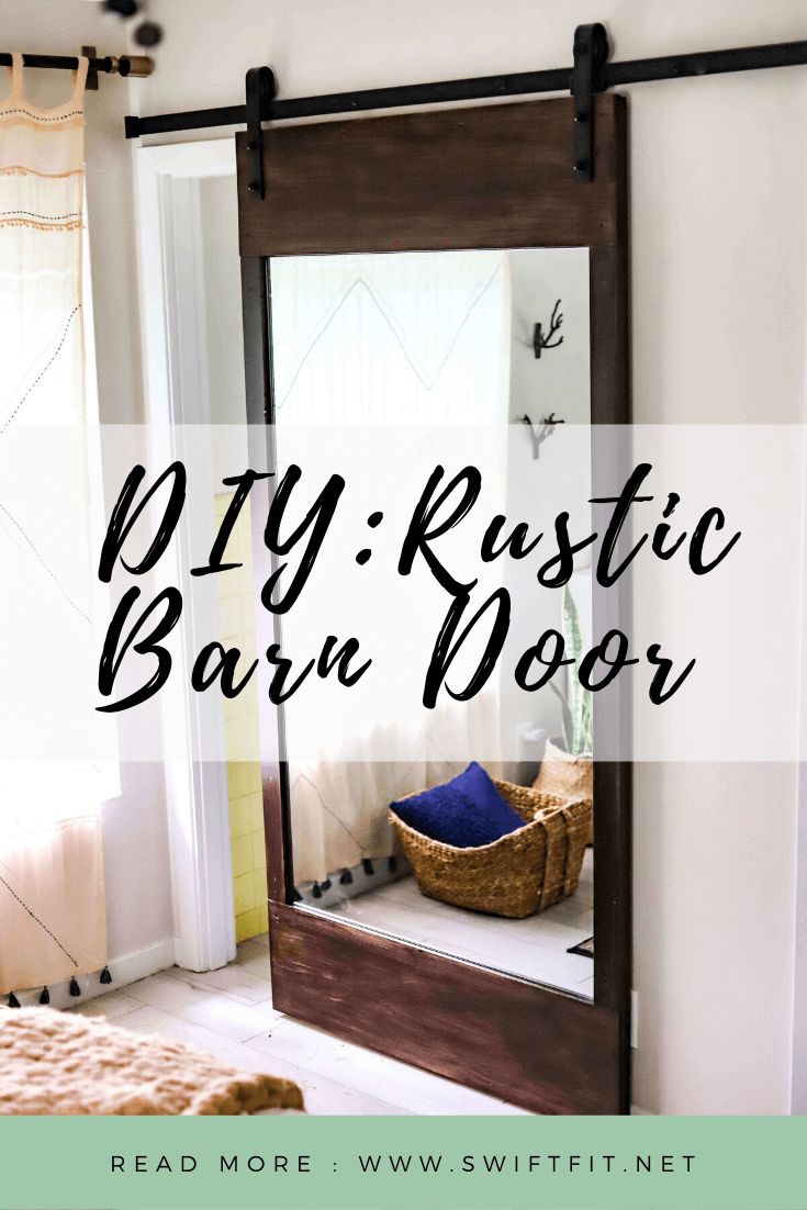 a mirror with the words diy rustic baru door on it in front of a bed