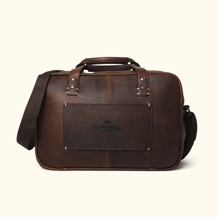 Modern Leather Pilot Bag | Vintage Oak Vintage Leather Duffle Bag With Waxed Finish, Vintage Oiled Leather Travel Bag, Leather Briefcase With Luggage Sleeve In Cognac, Cognac Leather Briefcase With Luggage Sleeve, Rugged Leather Backpack For Everyday, Rugged Brown Travel Bag With Luggage Sleeve, Vintage Vegetable Tanned Leather Travel Bags, Rugged Satchel With Waxed Finish For Travel, Rugged Travel Satchel With Waxed Finish