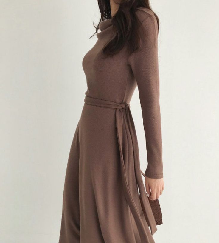 Fitted A-line Belted Dress For Fall, Fitted A-line Wrap Dress With Tie Waist, Brown A-line Midi Dress For Evening, Fitted A-line Maxi Dress In Solid Color, Fall A-line Belted Midi Dress, Long Fitted Dress In A Specific Color, Long Fitted Solid Color Dresses, Solid Color Long Fitted Dress, Chic Long Dresses With Tie Waist