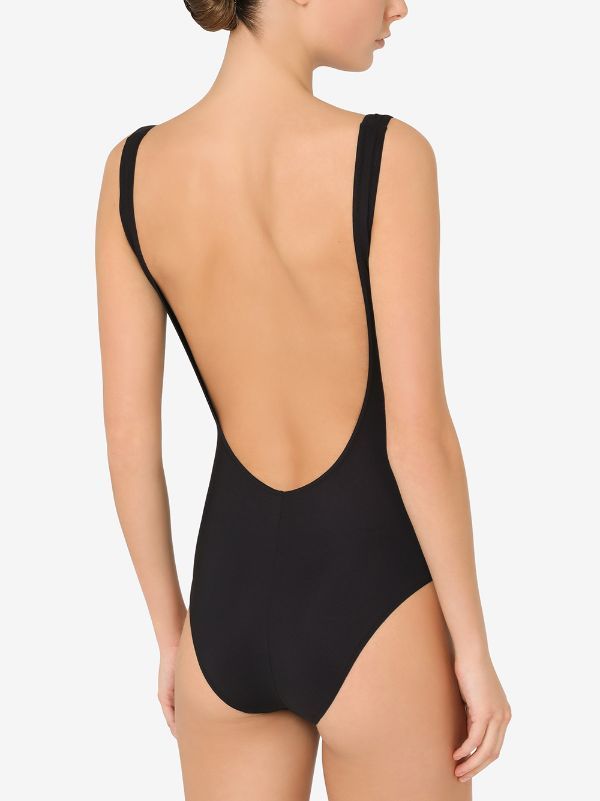 Dolce & Gabbana scoop-back Swimsuit - Farfetch Sleek Bodysuit With Scoop Back For Swimming, Elegant Black Scoop Neck Swimwear, Scoop Back Swimwear With Minimal Stretch, Chic Scoop Back Swimwear For Poolside, Chic Poolside Scoop Back Swimwear, Elegant Scoop Back Swimwear For Beach, Sleek Swimwear With Lined Body And Scoop Back, Chic Stretch Swimwear With Scoop Back, Elegant Stretch Swimwear With Scoop Back