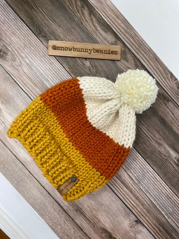 "I just love Fall, its the perfect time of year. Orange, yellow and reds all very, the cold hits and you get to put on your favorite beanies! This one is one of them. Candy Corn wool beanie. Its the perfect touch for Fall. KIDS AND BABY SIZE AVAILABLE → https://www.etsy.com/listing/1011330930/candy-corn-beanie-newborn-candy-corn-hat?ga_order=most_relevant&ga_search_type=all&ga_view_type=gallery&ga_search_query=candy+corn+beanie&ref=sc_gallery-1-1&plkey=21e9560e7f49d357c361aa9 Warm White Bonnet For Fall, White Acrylic Hat For Fall, Playful Warm Hats For Fall, Knitted Fall Bonnet, Orange Beanie For Winter, Playful Adjustable Hats For Fall, Cute Beanie For Fall, One Size, Cute Beanie Hats For Fall, Yellow Beanie Cap For Winter