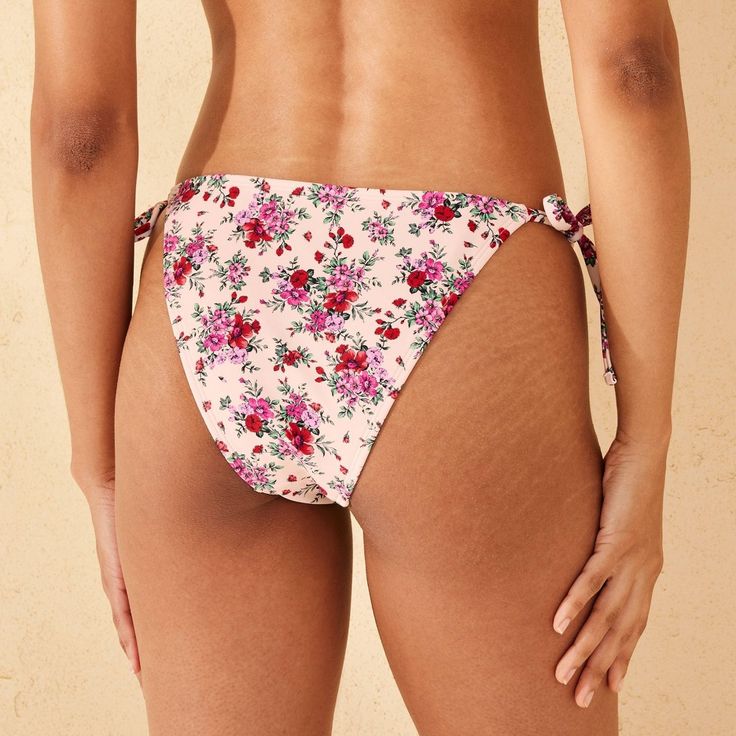 Women's Low-Rise Ultra High Leg Extra Cheeky Side-Tie Bikini Bottom - Wild Fable™ Pink/Red Floral Print L Summer Swimwear With Side Ties And Tie-side Bottom, Drawstring Bottoms For Sunbathing On Vacation, Vacation Drawstring Bottoms For Sunbathing, Beachwear Bottoms For Sunbathing With Tied Details, Adjustable Side Ties Beach Bottoms, Summer Bottoms With String Tie For Sunbathing, Fitted Swimwear With Adjustable Tie-side Bottom, Beach Swimwear With Adjustable Tie-side Bottom, Beachwear Swimwear With Adjustable Tie-side Bottom