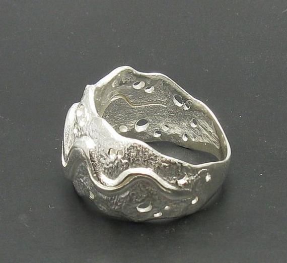 Stylish sterling silver ring 925/1000. Stamped 925.Approximate weight 7.0 grams. Width 1.5cm (0.59 inches). All our jewels are made from solid sterling silver 925/1000 and are carefully crafted by hand in our family workshop. We dispatch your orders in 5 working days, worldwide and the postage is $5. We ship registered priority mail. Please allow 5-7 working days for delivery in Europe and 10-15 working days outside Europe. For any questions - please do not hesitate to contact me! Sterling Silver Concave Ring Stamped 925, Silver Hallmarked Wide Band Ring, Silver Wide Band Hallmarked Ring, Hand Cast Sterling Silver Wide Band Jewelry, Hand Cast Silver Ring Jewelry, Hand Cast Silver Rings For Anniversary, Unique Silver Rings For Formal Occasions, Sterling Silver Concave Rings Hallmarked, Sterling Silver Concave Hallmarked Rings