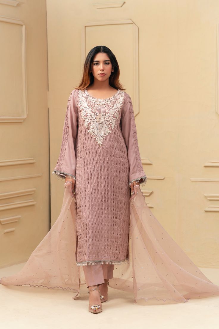 This stunning Shalwar Kameez features a luxurious silk and pearl detailed material, adorned with hand-embroidered off-white neckline. The intricate pattern and rich colors make it a perfect choice for any special occasion. Complete the look with the included organza dupatta with full chhan for a sophisticated and elegant ensemble. 3-Piece Suit Eid Cream Traditional Wear With Sheer Dupatta, Cream Georgette Anarkali Set For Eid, Formal Georgette Churidar With Intricate Embroidery, Elegant Georgette Churidar With Intricate Embroidery, Cream Georgette Kurta With Sheer Dupatta, Formal Georgette Churidar With Straight Kurta, Cream Silk Anarkali Salwar Kameez, Eid Semi-stitched Organza Anarkali Set, Cream Bollywood Salwar Kameez For Party