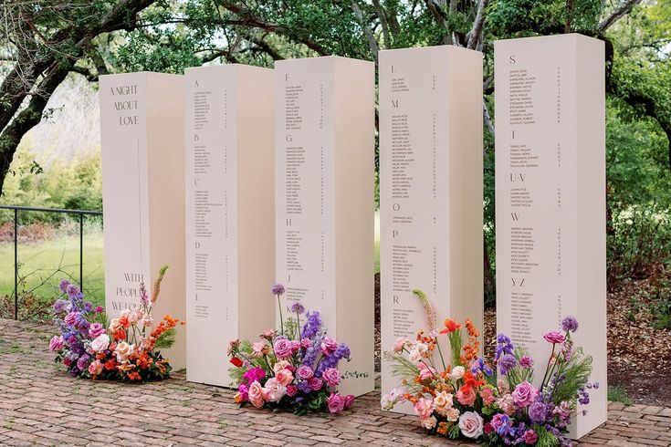 flowers are placed in front of the names of people who served them