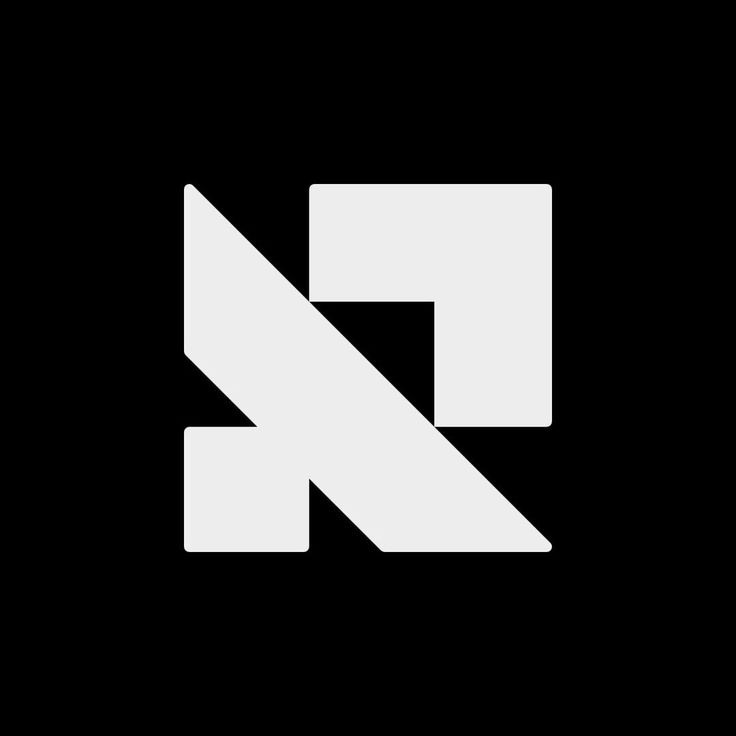 the letter k is made up of two white letters on a black background with an arrow in the middle