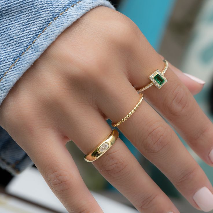 Elegant dome ring with a minimalist center stone is the perfect statement piece. It's dainty and pairs well with other rings. D E T A I L S ▫︎ Made of High Quality 925 Sterling Silver ▫︎ Finish: Thick Plating of 14k Gold or Rhodium ▫︎ Dimensions: 4.5 mm in Height ▫︎ Available in Sizes 4 - 10 Made with 100% Pure Love Comes in a gift box, ready for gift-giving! Minimalist Emerald Cut Rings For Everyday, Minimalist Everyday Emerald Cut Rings, Minimalist Emerald Cut Stackable Rings, Minimalist Green Signet Ring, Everyday Minimalist Emerald Cut Ring, Emerald Cut Rings For Everyday Wear, Minimalist Emerald Gemstone Ring, Minimalist Everyday Crystal Open Ring, Minimalist Emerald Cut Birthstone Ring