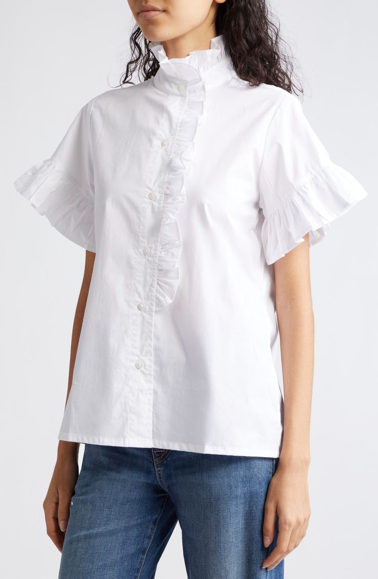 A crisp cotton blouse goes in for the charm with ripples of ruffles embellishing the placket and sleeves. 26" length (size Medium) 100% cotton Dry clean Imported Classic Cotton Top With Ruffled Collar, Office Shirt With Ruffled Collar And Details, Feminine Ruffled Cotton Blouse, Feminine Cotton Blouse With Ruffles, Classic Ruffled Shirt For Office, Cotton Ruffle Tops For Daywear, Cotton Ruffle Blouse For Daywear, Classic Cotton Shirt With Ruffles, Cotton Blouse With Ruffled Collar