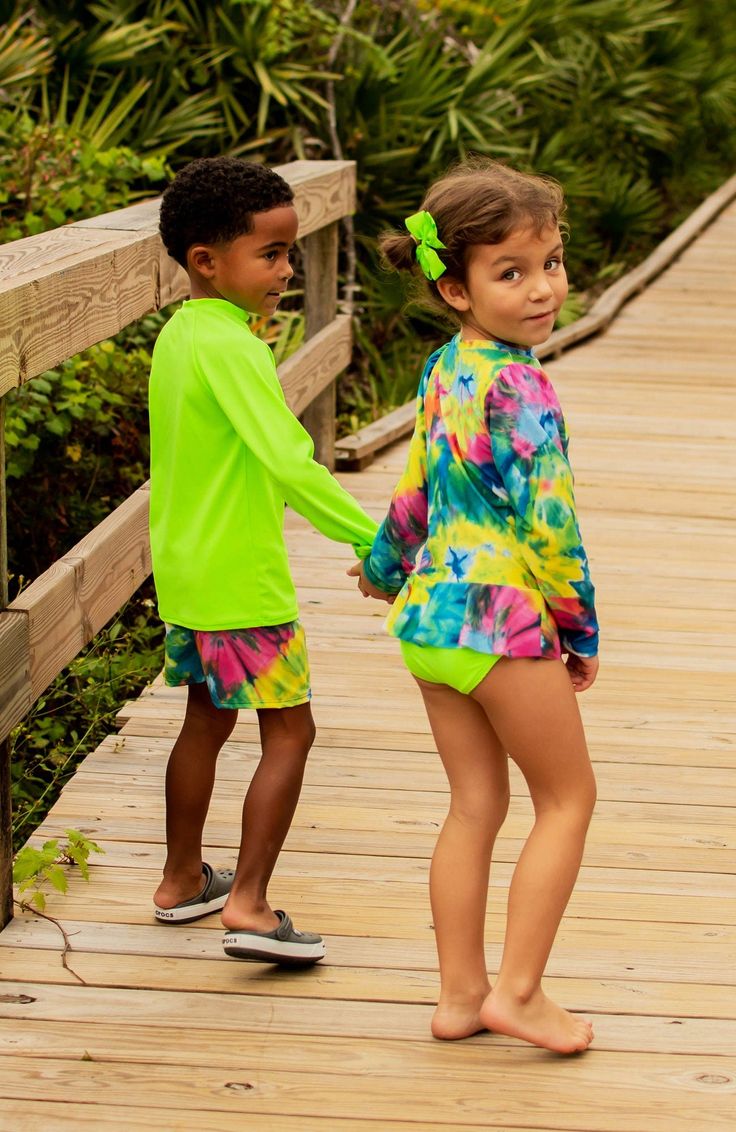 Your little one will shine bright this summer in this lime green UPF 50+ long sleeve sun shirt. Proudly made in the USA! Long Sleeve Rash Guard With Uv Protection For Playwear, Casual Rash Guard For Spring Swimming, Casual Spring Rash Guard For Swimming, Casual Rash Guard With Uv Protection For Spring, Casual Spring Rash Guard With Uv Protection, Casual Uv Protection Rash Guard For Spring, Casual Rash Guard With Uv Protection For Playwear, Playful Long Sleeve Rash Guard Upf 50+, Playful Long Sleeve Rash Guard With Uv Protection