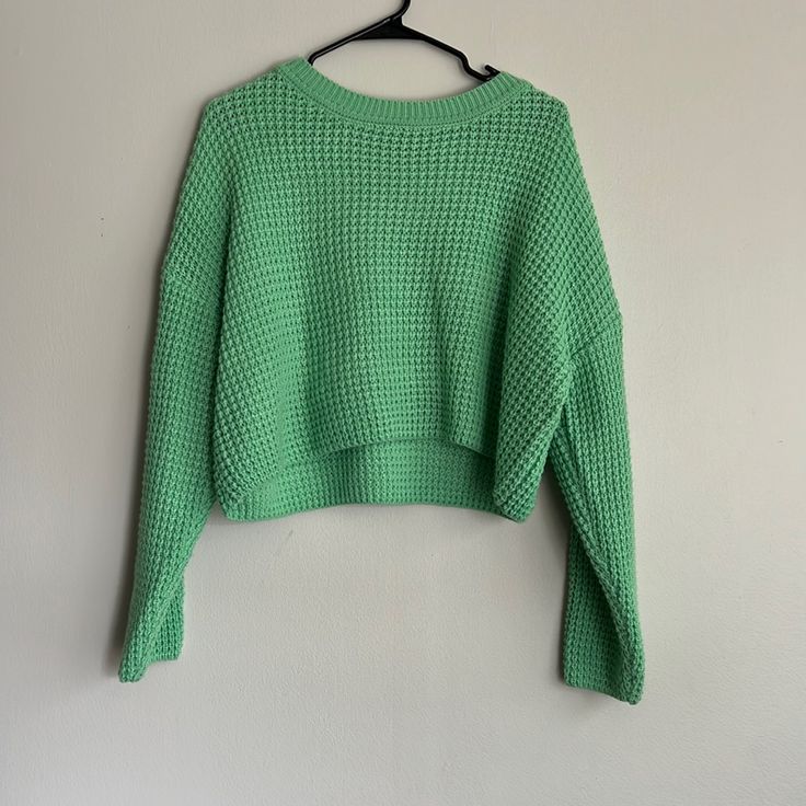 Never Worn, Super Soft Green Knit Cropped Sweater With Crew Neck, Green Acrylic Sweater For Spring, Green Textured Knit Cropped Sweater With Crew Neck, Green Long Sleeve Textured Cropped Sweater, Green Textured Knit Cropped Sweater For Winter, Green Textured Knit Casual Sweater, Casual Green Textured Knit Sweater, Green Soft Knit Cropped Sweater With Crew Neck, Green Soft Knit Crew Neck Cropped Sweater