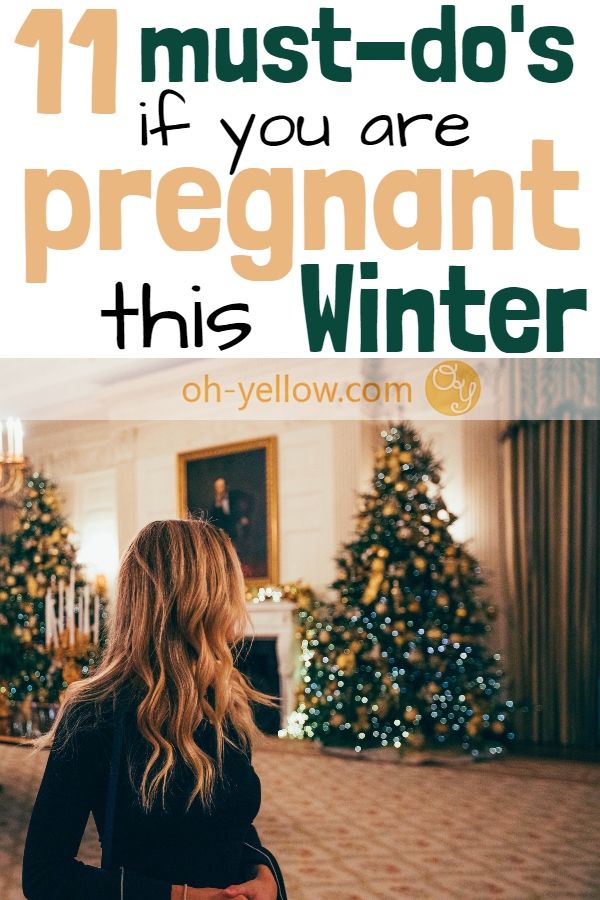 a woman standing in front of a christmas tree with the words 11 must - do's if you are pregnant this winter