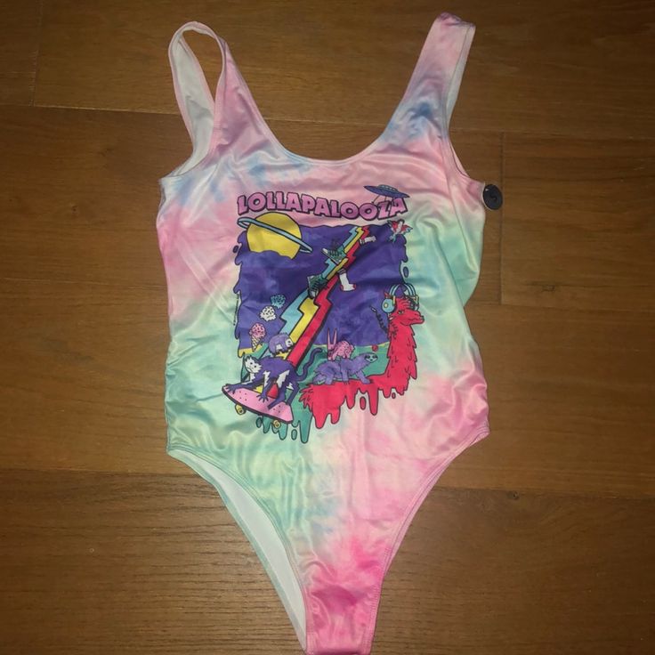 Lollapalooza Tyedye Bodysuit | New With Tags Beautiful Graphic And Pink And Blue Tyedye Size Small Never Worn, Perfect Condition Tie Dye Swimwear For Summer Pool Days, Summer Tie Dye Swimwear For Pool, Tie Dye Swimwear For Pool In Summer, Summer Tie-dye Swimwear For Pool, Tie-dye Swimwear For Summer Pool, Summer Tie Dye Swimwear For Swimming, Pink Swimwear For Summer Music Festival, Tie Dye Swimwear For Summer Beach Party, Pink Swimwear For Music Festival