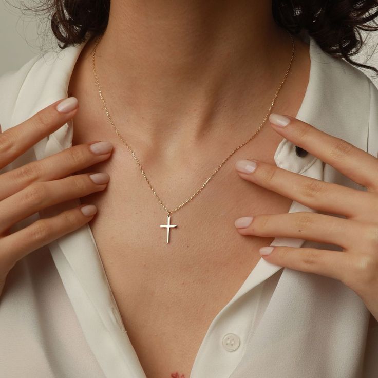 Showcase your faith with our Cross Pendant Necklace. The perfect gift for confirmation, christening, or any special occasion. Made for women who want to make a statement of their belief in a stylish and elegant way. Get one for yourself or a loved one today! Pendant width: 10 Millimeters; Pendant height: 16 Millimeters Please note that we also offer matching Cross Bracelet in our shop! Elegant Crucifix Cross Necklace, Gift Rose Gold Crucifix Cross Necklace, Elegant Clavicle Chain Cross Necklace For Gift, White 14k Gold Cross Necklace Gift, White 14k Gold Cross Necklace As Gift, Rose Gold Crucifix Necklaces For Anniversary, 14k Gold White Cross Necklace As Gift, Rose Gold Crucifix Necklaces For Anniversaries, Rose Gold Cross Jewelry For Mother's Day