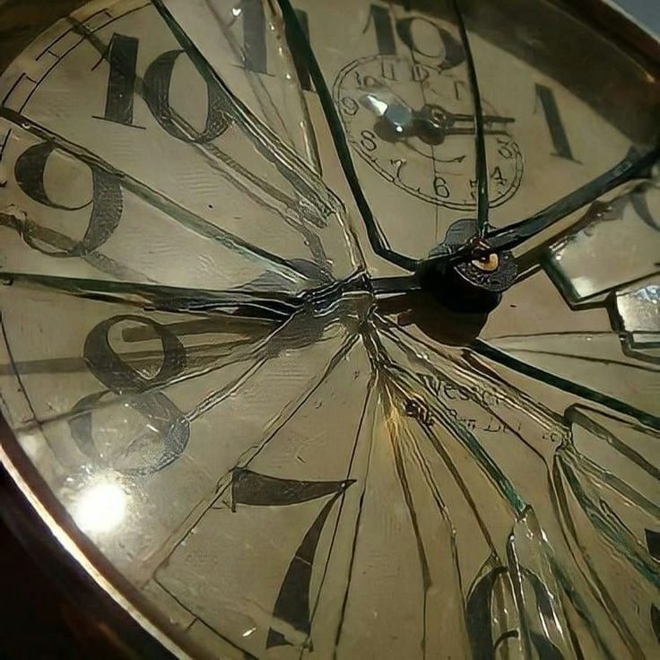 a close up of a clock face with numbers on the inside and outside of it