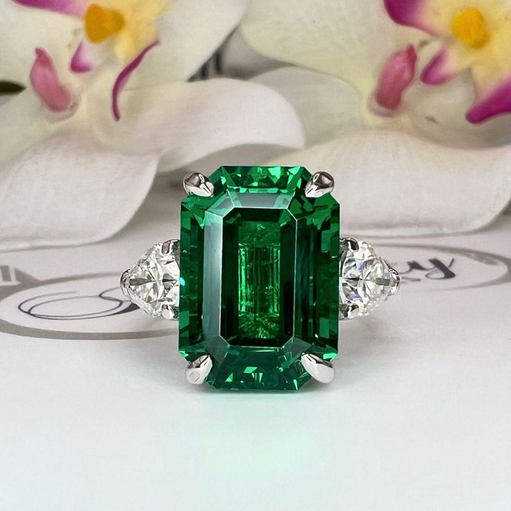 Sleek sellouts! 🤓. Order Emerald Cut Emerald Engagement Ring 14K Solid gold With Lab Grown Diamond Pear Shaped Accents , May Birthday Gift For Her Handmade Jewelry at $2000.00 #14kSolidGold #TrendyGiftForHer #MayBirthday #HandmadeJewelry #EmeraldRing #EngagementRing #LabGrownDiamond #GiftForHer #PearShapedRing #EmeraldCut Luxury Classic Teardrop Emerald Ring, Luxury Pear-shaped Emerald Ring Gift, Elegant Trillion Cut Gia Certified Emerald Ring, Elegant Gia Certified Trillion Cut Emerald Ring, Luxury Trillion Cut Emerald Jewelry, Gia Certified Trillion Cut Emerald Ring For Anniversary, Elegant Pear-shaped Emerald Ring With Prong Setting, Elegant Pear-shaped Prong Set Emerald Ring, Formal Pear-shaped Brilliant Cut Emerald Ring