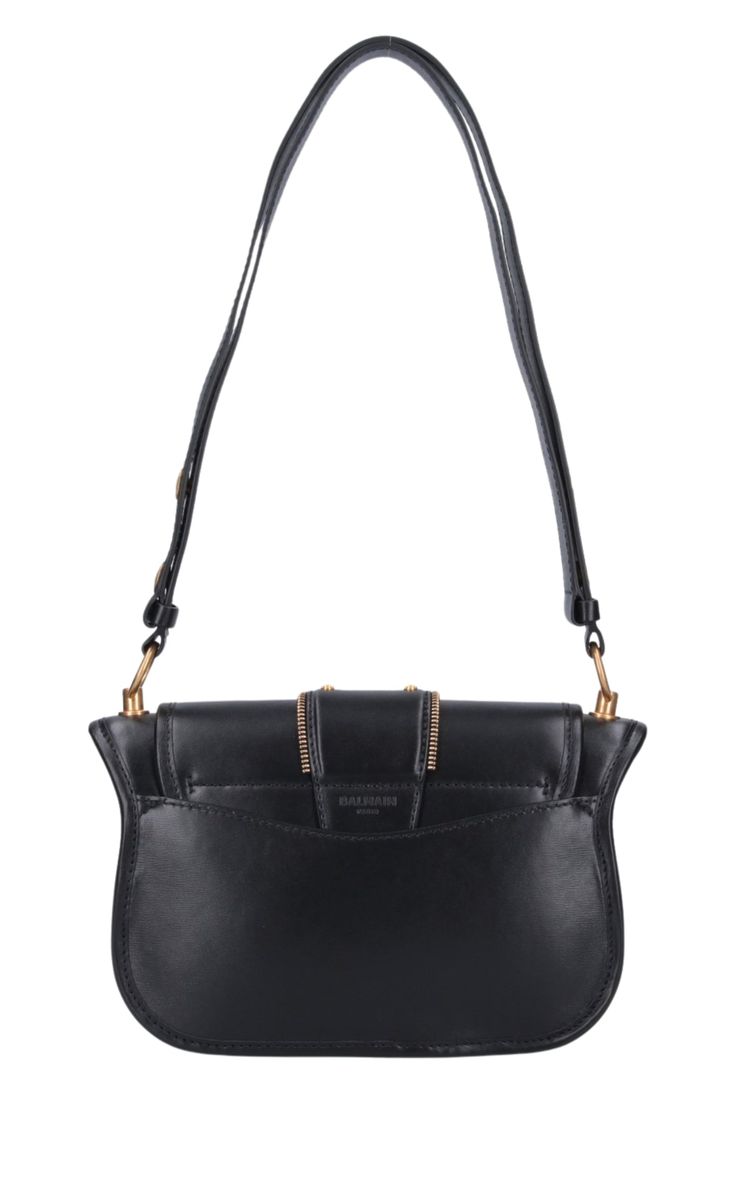 The Balmain Blaze Leather Shoulder Bag in black boasts an adjustable top leather shoulder strap for added convenience, secured with a snap flap closure. Its gold flap logo and double buckle detail on the front add a touch of sophistication. Plus, the bag features a flat back pocket and interior flat pocket within the spacious main compartment. Size and fit: H 6"/15cm X L 9"/23cm X D 2.75"/7 cmStrap span: 24.9"/63 cmComposition: 100% Calfskin LeatherHardware: Golden metalSignature dust bag includ Black Flap Bag With Turn-lock Closure For Office, Gold Shoulder Bag With Turn-lock Closure For Work, Gold Shoulder Bag With Turn-lock For Work, Gold Business Shoulder Bag With Turn-lock Closure, Gold Leather Bag With Turn-lock Closure, Gold Leather Shoulder Bag With Turn-lock Closure, Black Leather Saddle Bag With Gold-tone Hardware, Timeless Black Flap Bag With Turn-lock Closure, Luxury Shoulder Bag With Brass Hardware