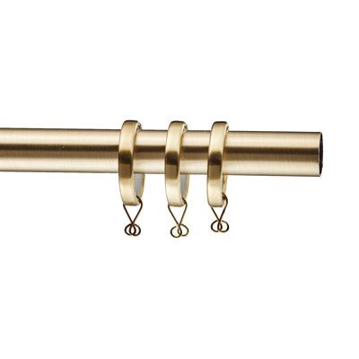 the brass curtain rod has four hooks on each end