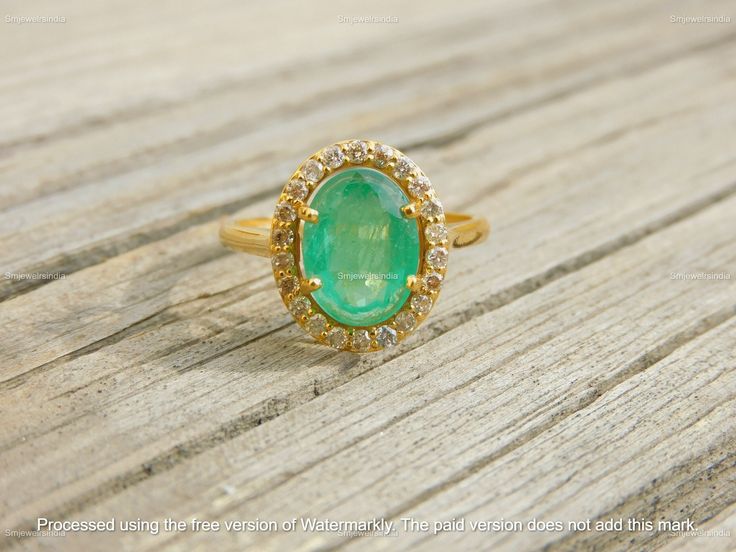 Oval Natural Emerald And Diamond Ring - 14K Solid Gold Ring - Emerald Wedding Ring - Perfect Bridal Gift For Women - Gift For Wife GEMSTONE DETAILS : ✦ Gemstone : Natural Emerald ✦ Gemstone Size : 8.40 mm width and 10.80 mm length ✦ Gemstone Shape : Oval Shape ✦ Number of Gemstones : 1 ✦ Gemstone Weight : 3 Carat ✦ Gemstone Grade : AAA DIAMOND DETAILS : ✦ Diamond Type : Natural ✦ Diamond Size : 1.50 MM ✦ Diamond Color : G-H ✦ Diamond Clarity : Slightly included ✦ Diamond Cut : Excellent ✦ Diamond Weight : 0.50 Carat METAL DETAILS : ✦ Metal : 14K/18K /22K Gold ✦ Metal Color : Yellow / White / Rose Gold ✦ Setting : Prong Setting ✦ Box : Yes SHIPPING DETAILS : ✦ Production time : 3-4 days ✦ Delivery time : 7-8 days ✦ Expedited shipping : Available ✦ Expedited shipping service : UPS ✦ Expedite 14k Gold Halo Ring With Prong Setting For Wedding, Yellow Gold Halo Ring With Brilliant Cut For Wedding, Yellow Gold Wedding Halo Ring With Brilliant Cut, Yellow Gold Brilliant Cut Halo Wedding Ring, Emerald Cut Halo Jewelry For Wedding, Heirloom Yellow Gold Emerald Ring With Halo Design, Emerald Cut Halo Ring For Wedding, Wedding Emerald Cut Halo Emerald Ring, 14k Gold Emerald Ring With Center Stone For Wedding