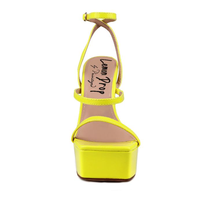 Vegan leather upper with man made sole Ankle buckle closure Heel measures approx. 5.5" H Platform measures approx. 1.5" H Imported Gorgeous Leather, Current Trends, White Turquoise, Lemon Drop, Neon Yellow, Black Pumps, Platform Heels, Shoe Box, Classic Black