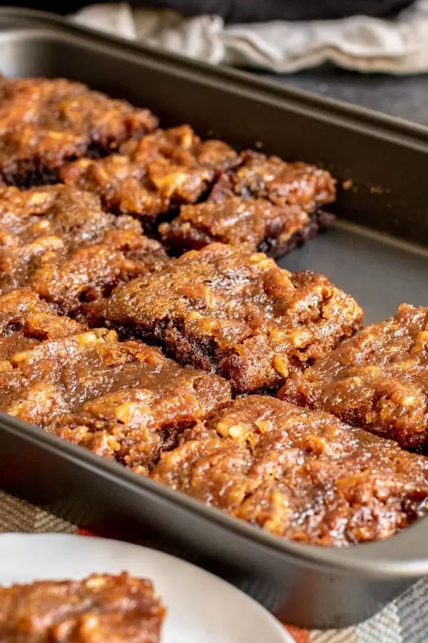 pecan pie brownies in a pan on a table