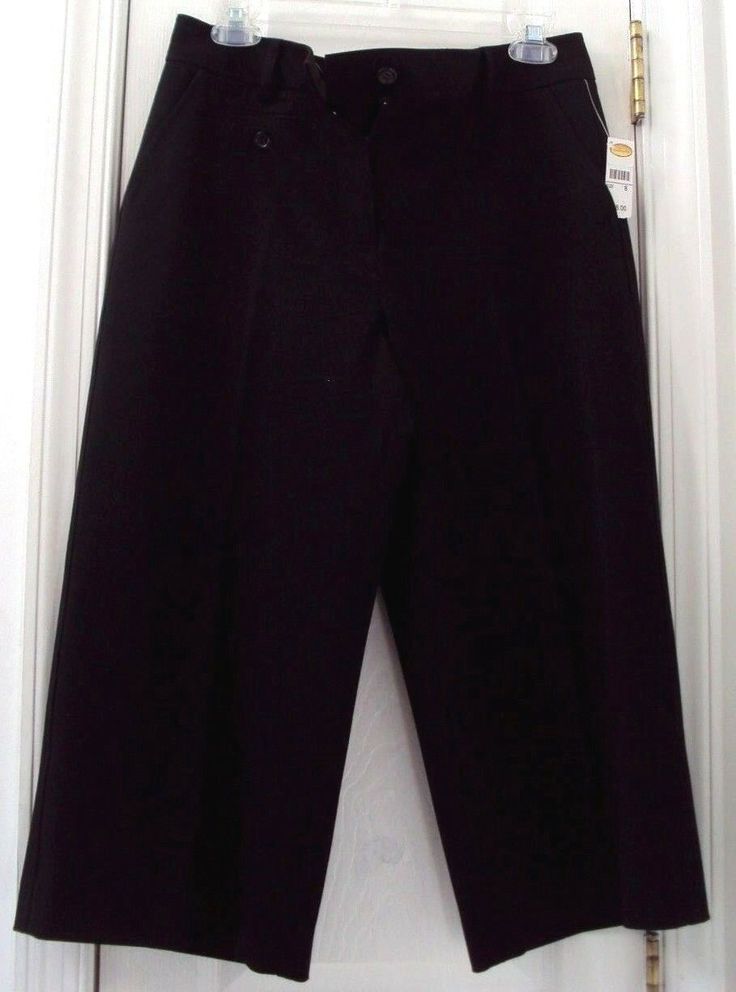 PLEASE...BE AWARE COLORS MAY VARY; PENDING ON THE SETTINGS ON YOUR MONITOR.  PLEASE…REVIEW THE MEASUREMENTS (LOCATED TOWARDS THE BOTTOM OF THE DESCRIPTION AREA) TO PREVENT SHIPPING EXPENSE!   NEW W/ TAG! HIGH QUALITY!! AUTHENTIC!!! TALBOTS 'CAPRI' DRESS PANTS THIS HAS A HEAVIER KNIT MATERIAL SIZE: 8 COLOR: BLACK STRETCH FRONT ZIPPER w/ 1 BUTTON CLOSURE 1-3/4" TALL WAISTBAND INSIDE CURTAIN WAISTBAND BELT LOOPS NON PLEATED 3 FRONT & 2 (BUTTON) BACK POCKETS WIDE LEG CAPRI LENGTH NO INSIDE LINING 64 Capri Dress, Professional Attire, Heavy Knit, Viscose Rayon, Knitting Materials, Black Stretch, Front Zipper, Dress Pants, Capri