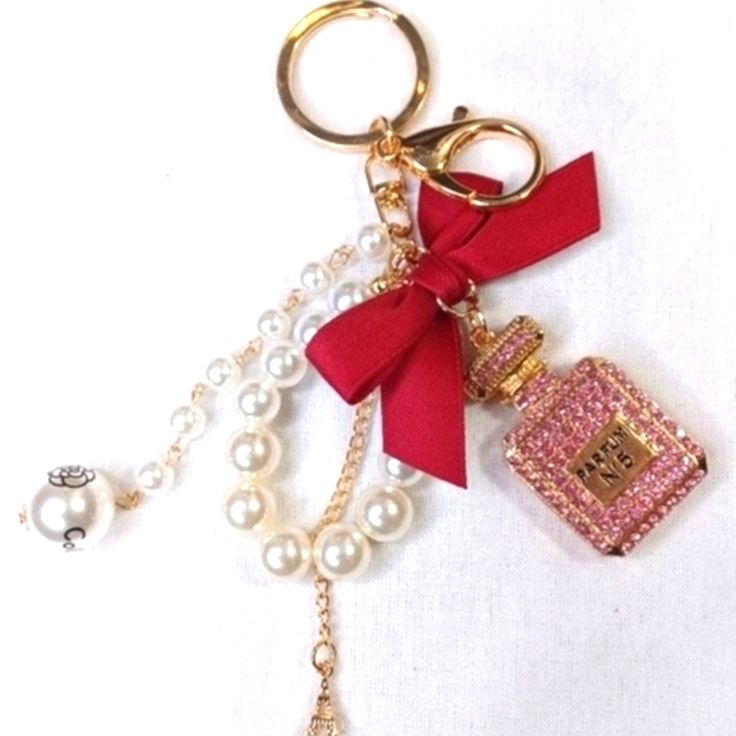 Perfum No.5 Keychain Bag Charm With Pearls And Bow. Beautiful To Level Up Your Favorite Purse. New!! 8723 Perfume Keychain, Bottle Keychain, Favorite Purse, Keychain Bag, No 5, Key Card Holder, Card Holders, Christmas List, Pink Gold