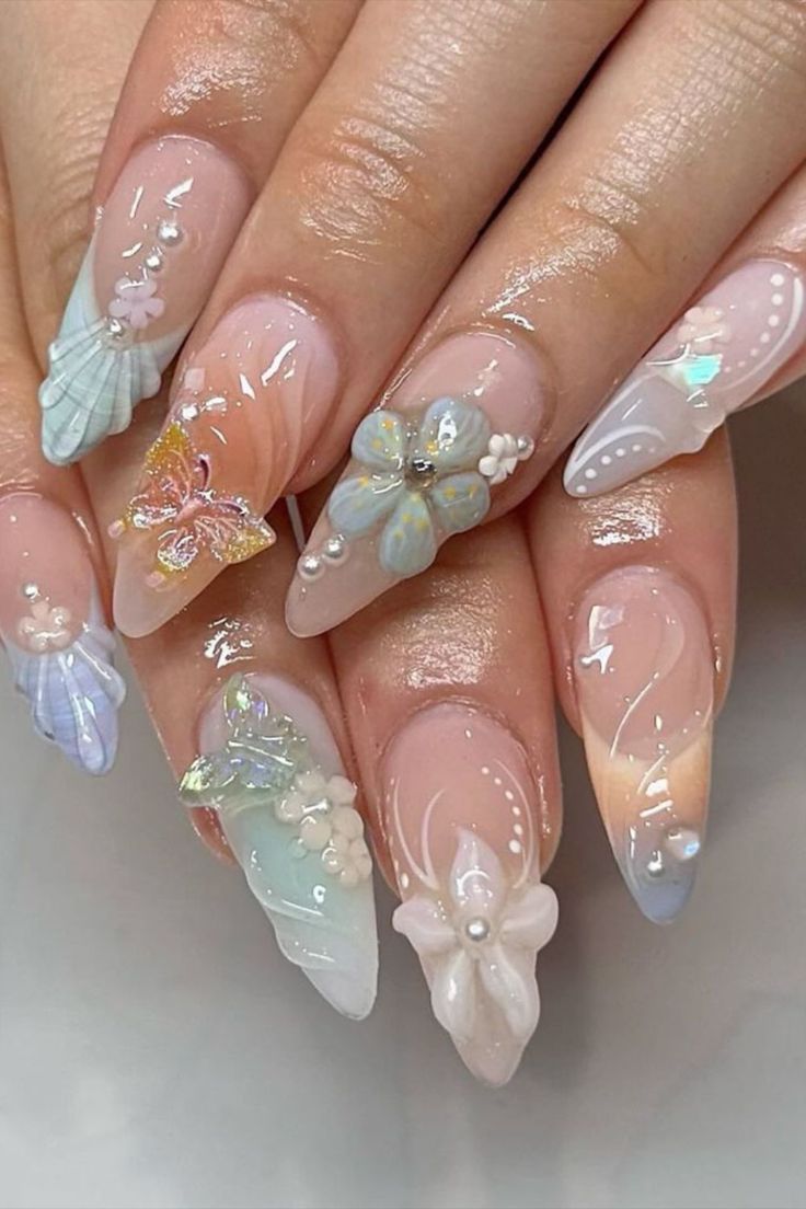 Achieve a harmonious blend of soft pastel tones and vibrant colors with this nail design by @shi_nailedit featuring 3D flowers and butterflies, creating a whimsical and enchanting look that’s perfect for adding a pop of color to your style while maintaining a delicate and feminine aesthetic. Don't miss out on the latest trends in nail art! Head over to nailustrous.com now to dive into our comprehensive article and discover a world of stunning ideas waiting just for you! Cute Nails 3d Flowers, 3d Nails Aesthetic, Nail Art With Flowers Design, Nail Inspo 3d Art, Nail Designs 3d Art, Colorful 3d Nails, Pastel Colorful Nails, Nail 3d Art, Butterfly 3d Nails