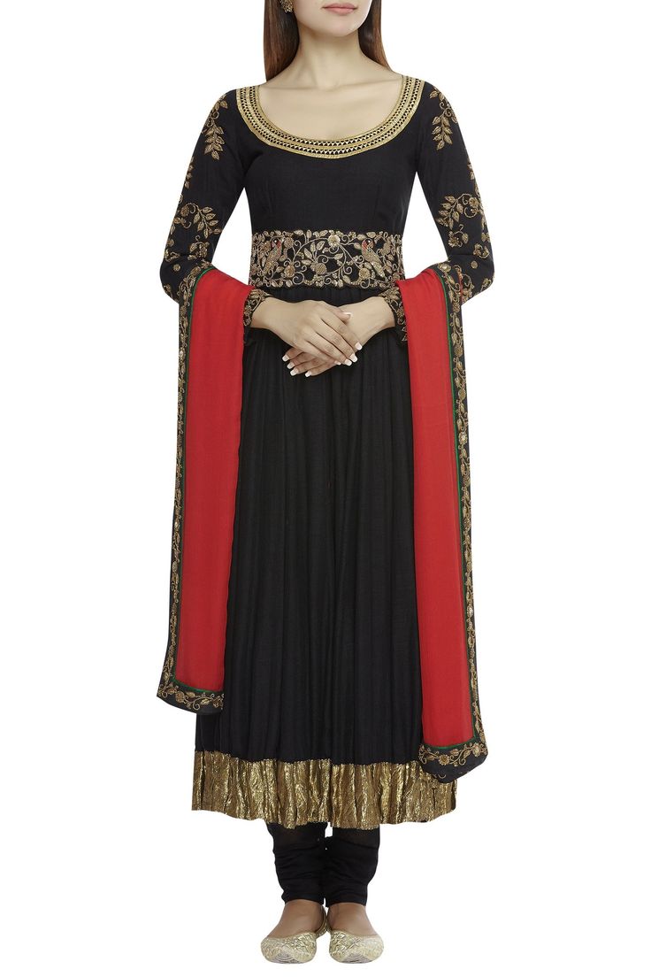 Black anarkali with placement floral motif work. Paired with plain churidar and cutwork detail tie-up belt. Comes with red dupatta.
Components: 4
Neckline: U Neckline
Sleeve Length: Full sleeves
Fabric: Raw Silk, Matka Silk, Chiffon
Color: Black, Red
Kurta, belt: Zardozi embroidery
Belt: Sequin, bead embellished
Tassel tie-up detail
Tiered sharara pants
Closure:
Kurta: Side zip
Cutwork detail belt - Aza Fashions Red Dupatta, Black Anarkali, Embroidery Belt, Sharara Pants, Red Kurta, Zardozi Embroidery, Embroidered Anarkali, Churidar, Full Sleeves