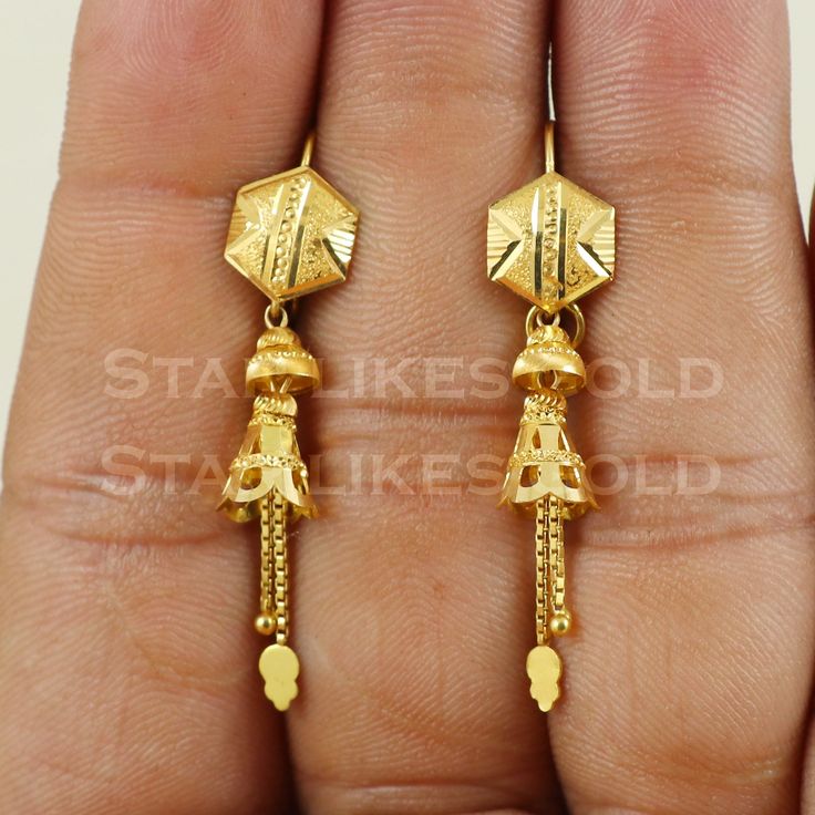 18K Gold Dangle Earrings Metal is Real Gold Purity is 18kt Weight is 2.55 grams approx Max Length is 4.2 cm approx Max width is 0.9 cm approx ,  these earrings comes with normal backs, if you want real gold screw please contact. Please feel free to ask if you have any query. Cute Wallpapers For Android, Gold Dangle Earrings, Earrings Metal, Gold Earrings Dangle, Gold Jewellery, Real Gold, Earrings Jewelry, Jewelry Earrings Dangle, Classic Design