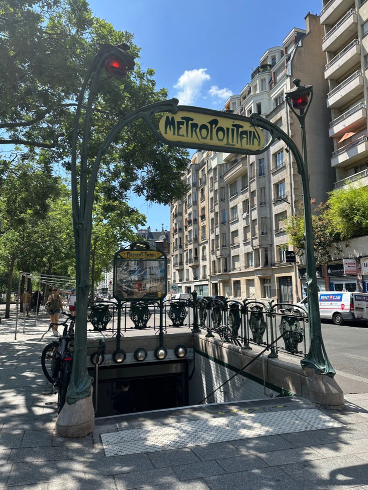 the metro station is located on the street corner